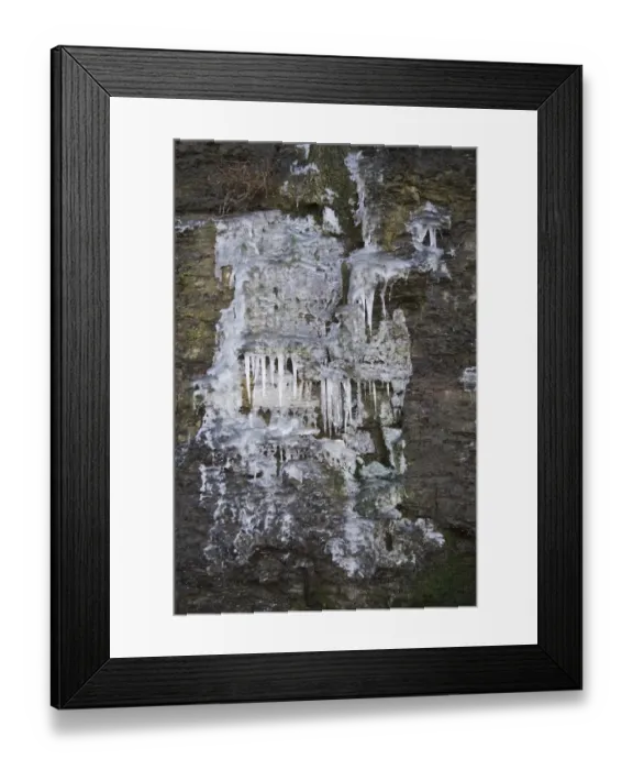 Framed Print : Icicles hanging from frozen cliff waterfall, Kimmeridge, Dorset, England, december Framed Print : Icicles hanging from frozen cliff waterfall, Kimmeridge, Dorset, England, december