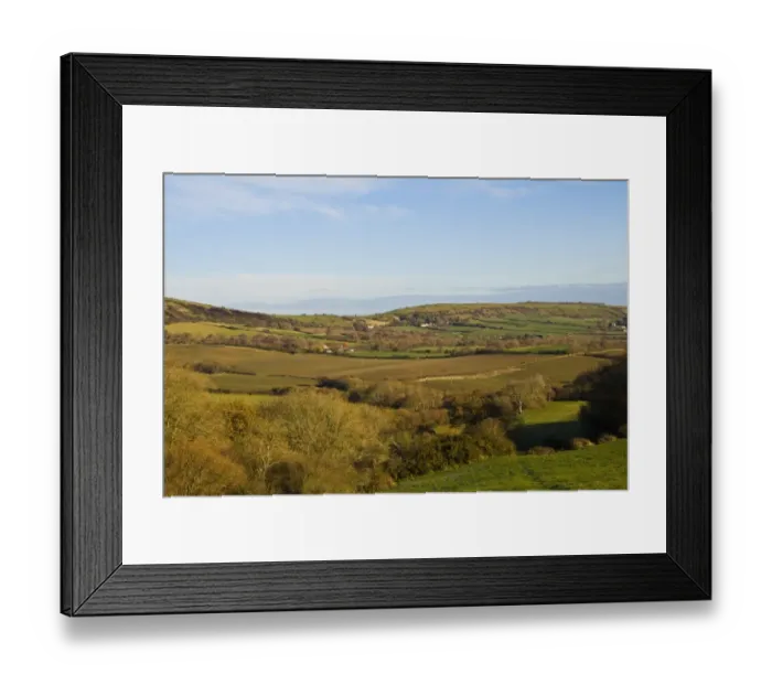 Framed Print : View over farmland, with fields, trees and distant hills, near Corfe, Dorset, England, december Framed Print : View over farmland, with fields, trees and distant hills, near Corfe, Dorset, England, december