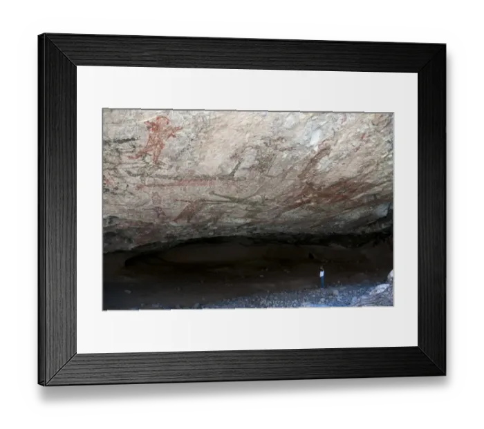 Framed Print : Tourist looking at San Borjitas cave paintings, oldest cave paintings in western hemisphere, circa 7500 years old Framed Print : Tourist looking at San Borjitas cave paintings, oldest cave paintings in western hemisphere, circa 7500 years old