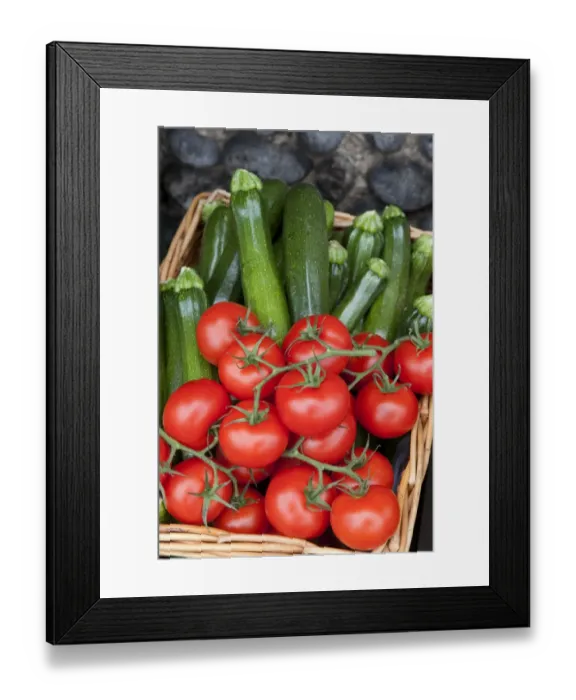 Framed Print : Tomato (Solanum sp. ) and Courgette (Cucurbita sp. ) harvested fruit in wicker basket, Norfolk, England, august Framed Print : Tomato (Solanum sp. ) and Courgette (Cucurbita sp. ) harvested fruit in wicker basket, Norfolk, England, august