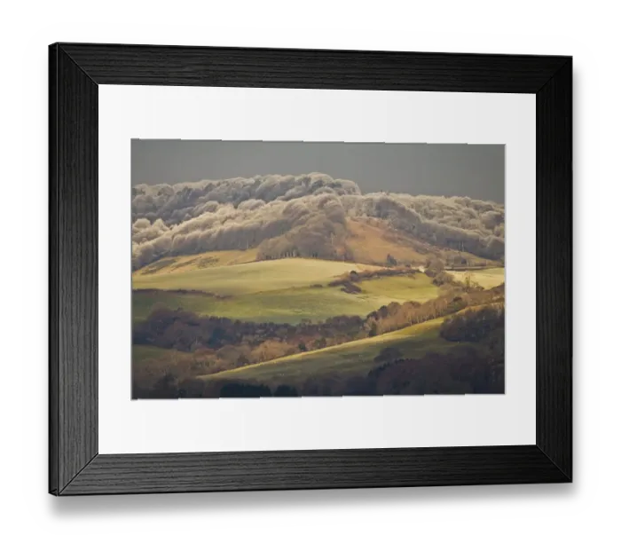 Framed Print : View of farmland with rime frost on trees of hilltop forest, Dorset, England, december