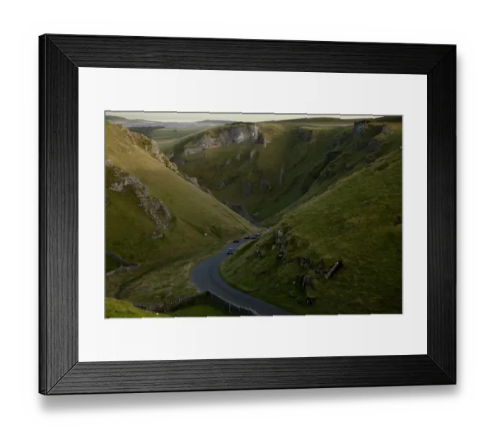 Framed Print : View of cars on road through moorland with limestone pinnacles, Winnats Pass, Hope Valley, Peak District, Derbyshire Framed Print : View of cars on road through moorland with limestone pinnacles, Winnats Pass, Hope Valley, Peak District, Derbyshire