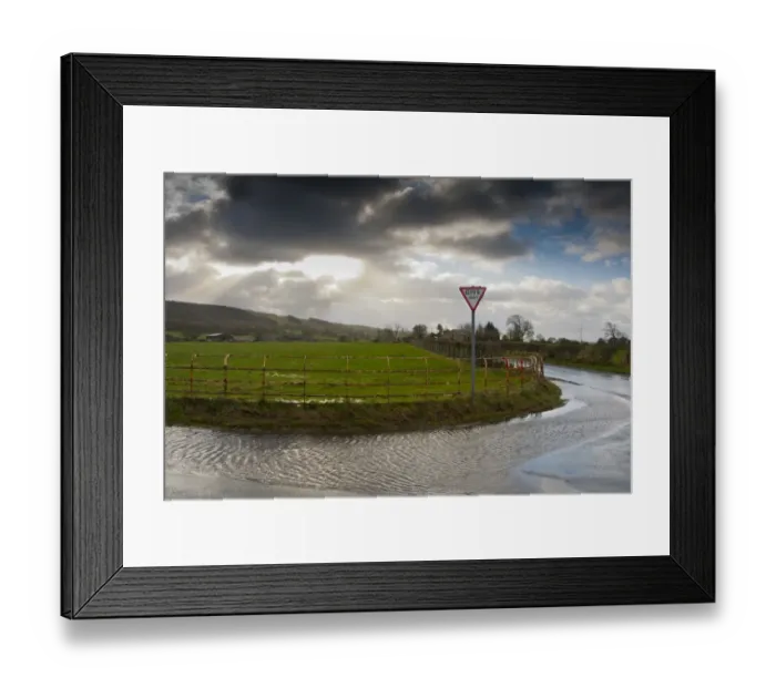 Framed Print : Stormclouds, Cheshire railings, Give Way sign and puddles on road, Thornley, Preston, Lancashire, England, december Framed Print : Stormclouds, Cheshire railings, Give Way sign and puddles on road, Thornley, Preston, Lancashire, England, december