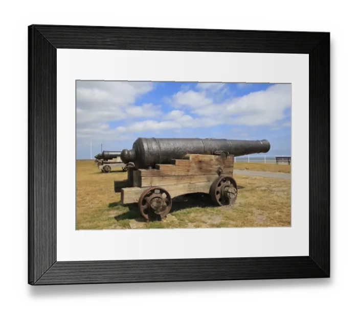 Framed Print : 18th Century 18-pounder guns on seafront of seaside town, Gun Hill, Southwold, Suffolk, England, may Framed Print : 18th Century 18-pounder guns on seafront of seaside town, Gun Hill, Southwold, Suffolk, England, may