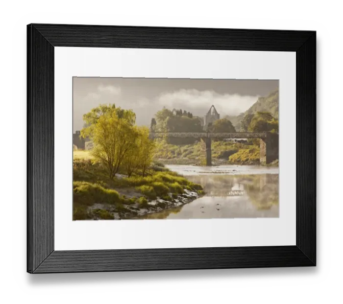 Framed Print : View of river, bridge and Cistercian abbey ruins at dawn, Tintern Abbey, Tintern, River Wye, Wye Valley, Monmouthshire Framed Print : View of river, bridge and Cistercian abbey ruins at dawn, Tintern Abbey, Tintern, River Wye, Wye Valley, Monmouthshire