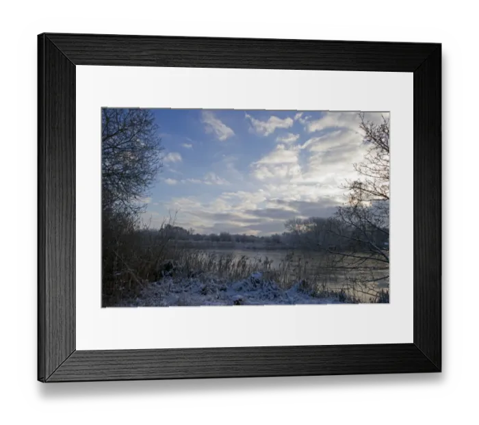 Framed Print : View of snow covered riverbank and frozen river, Ferry Lane Wood, River Yare, The Broads, near Postwick, Norfolk Framed Print : View of snow covered riverbank and frozen river, Ferry Lane Wood, River Yare, The Broads, near Postwick, Norfolk