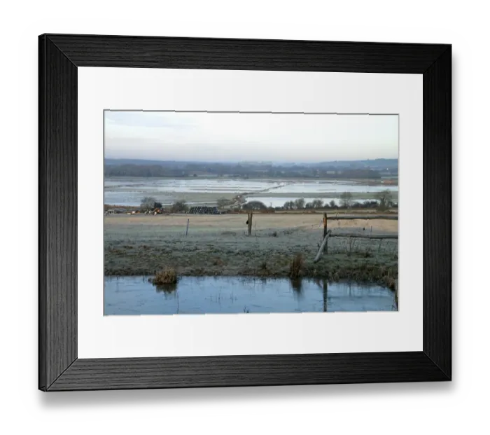 Framed Print : View of frost covered pasture towards flooded watermeadow habitat, Pulborough Brooks RSPB Reserve, West Sussex