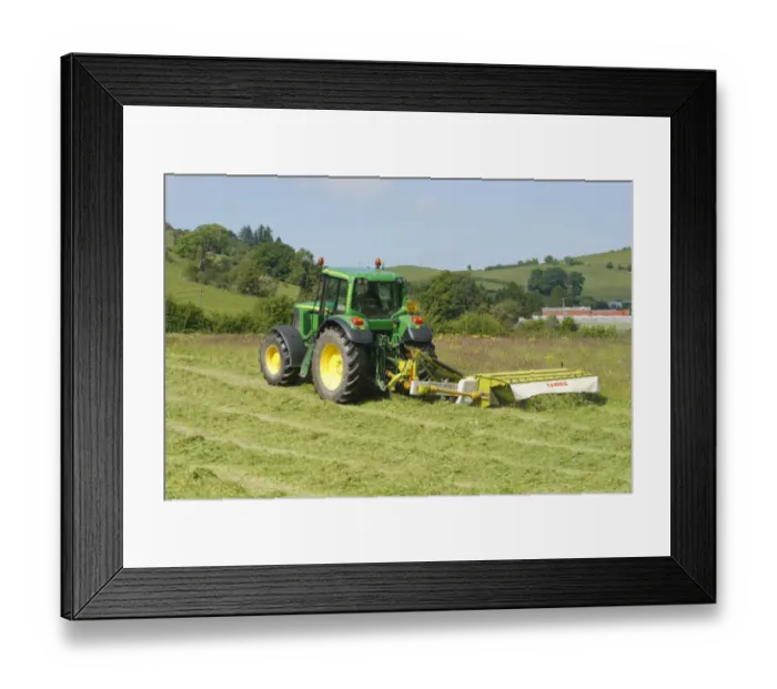 Framed Print : Contractor with John Deere tractor and Cls mower, cutting grass for silage on organic farm, Powys, Wales, june Framed Print : Contractor with John Deere tractor and Cls mower, cutting grass for silage on organic farm, Powys, Wales, june