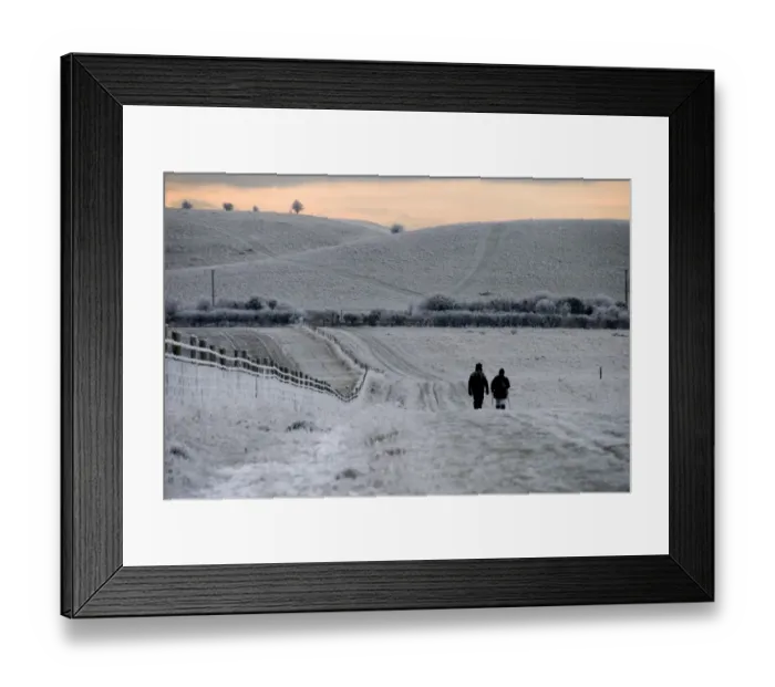 Framed Print : Walkers on frost and snow covered footpath at sunset, Ridgeway Path, near Pitstone Hill, Chilterns, Buckinghamshire Framed Print : Walkers on frost and snow covered footpath at sunset, Ridgeway Path, near Pitstone Hill, Chilterns, Buckinghamshire