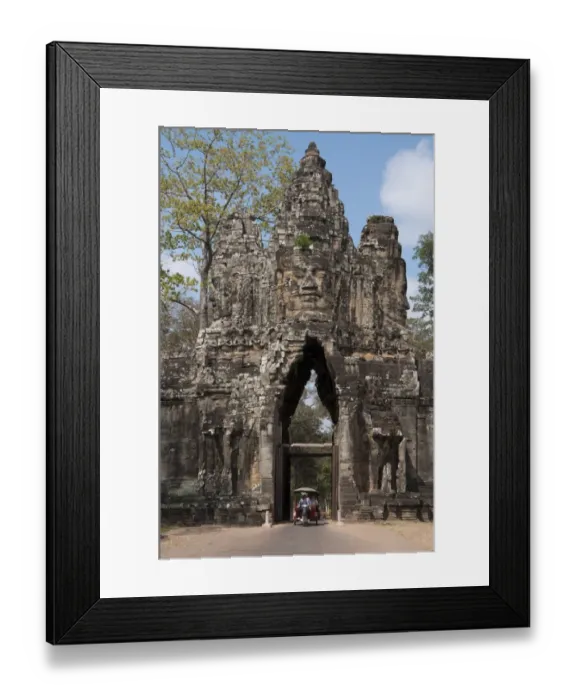 Framed Print : Rickshaw going through gate tower at Khmer temple, South Gate, Angkor Thom, Siem Riep, Cambodia Framed Print : Rickshaw going through gate tower at Khmer temple, South Gate, Angkor Thom, Siem Riep, Cambodia