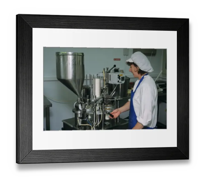 Framed Print : Dairy farming, worker using machine for cream production, Prosperous Home Farm, Hungerford, Berkshire, England Framed Print : Dairy farming, worker using machine for cream production, Prosperous Home Farm, Hungerford, Berkshire, England