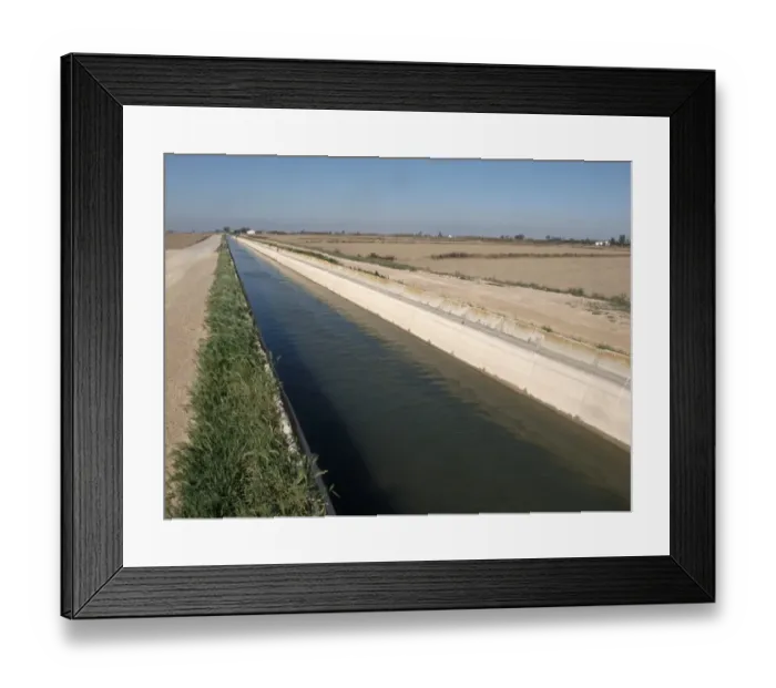 Framed Print : Irrigation canal carrying water to fields, Ebre Delta, Catalonia, Spain, april
