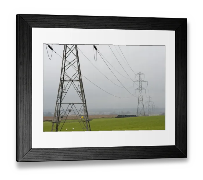 Framed Print : Electricity transmission pylons crossing over farmland, Forfar, Angus, Scotland, november Framed Print : Electricity transmission pylons crossing over farmland, Forfar, Angus, Scotland, november