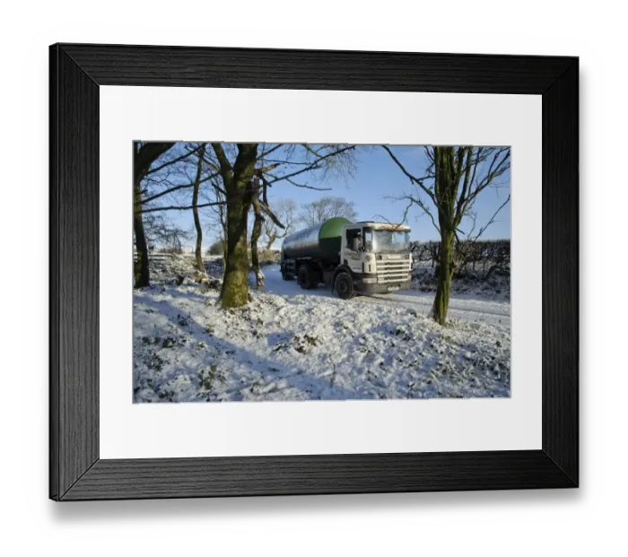 Framed Print : Milk tanker driving down snow covered farm track, Whitewell, Lancashire, England, november Framed Print : Milk tanker driving down snow covered farm track, Whitewell, Lancashire, England, november