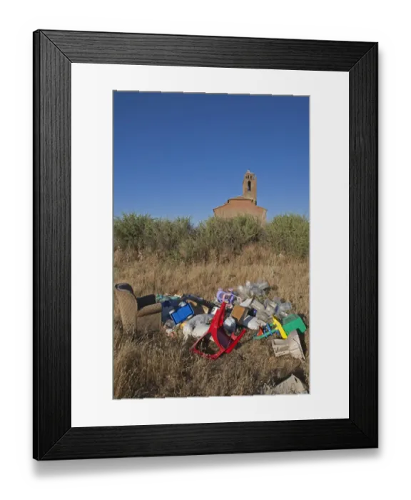 Framed Print : Flytipping of furniture and plastic rubbish in rural area, Northern Spain, july Framed Print : Flytipping of furniture and plastic rubbish in rural area, Northern Spain, july