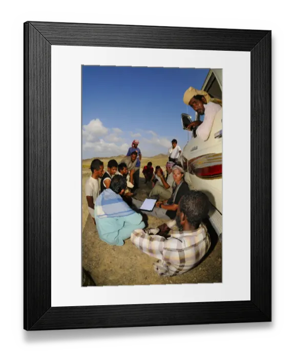 Framed Print : Researchers explaining to local people purpose of survey on island, Abd el-Kuri Island, Socotra, Yemen, april Framed Print : Researchers explaining to local people purpose of survey on island, Abd el-Kuri Island, Socotra, Yemen, april