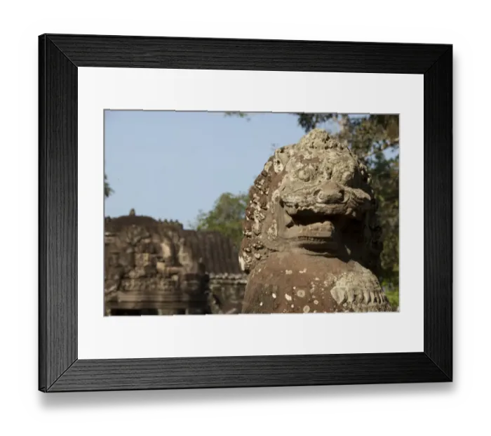 Framed Print : Guardian lion statue in Khmer temple ruins, Ta Prohm, Angkor, Siem Riep, Cambodia