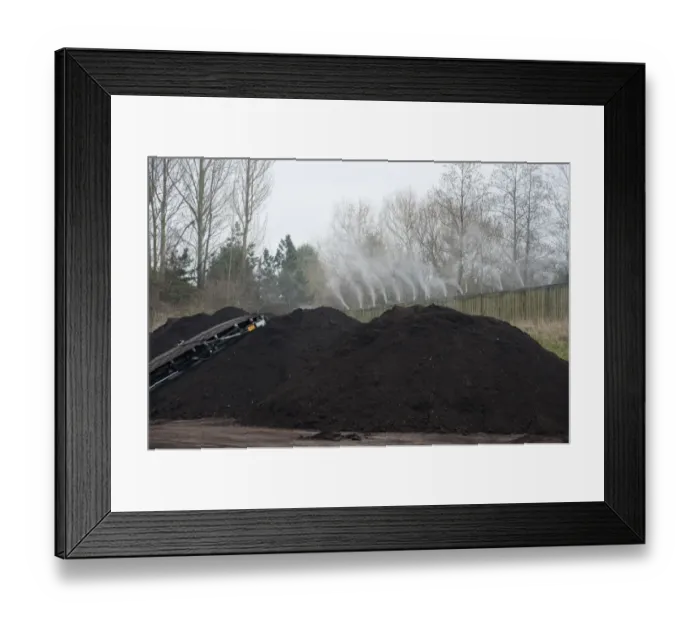 Framed Print : Peppermint perfume spraying over green compost heap at municipal waste site, near Chester, Cheshire, England, march Framed Print : Peppermint perfume spraying over green compost heap at municipal waste site, near Chester, Cheshire, England, march
