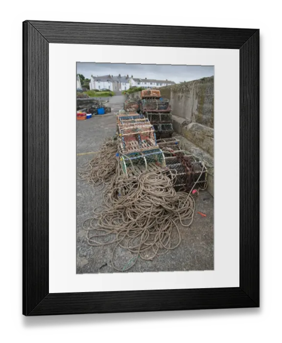 Framed Print : Lobster pots on quayside of harbour, Craster, Northumberland, England, july Framed Print : Lobster pots on quayside of harbour, Craster, Northumberland, England, july