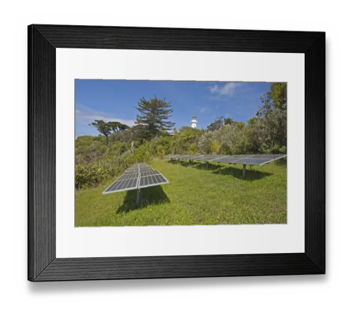Framed Print : Solar energy panels and lighthouse on island wildlife sanctuary, Tiritiri Matangi Island, Hauraki Gulf, North Island
