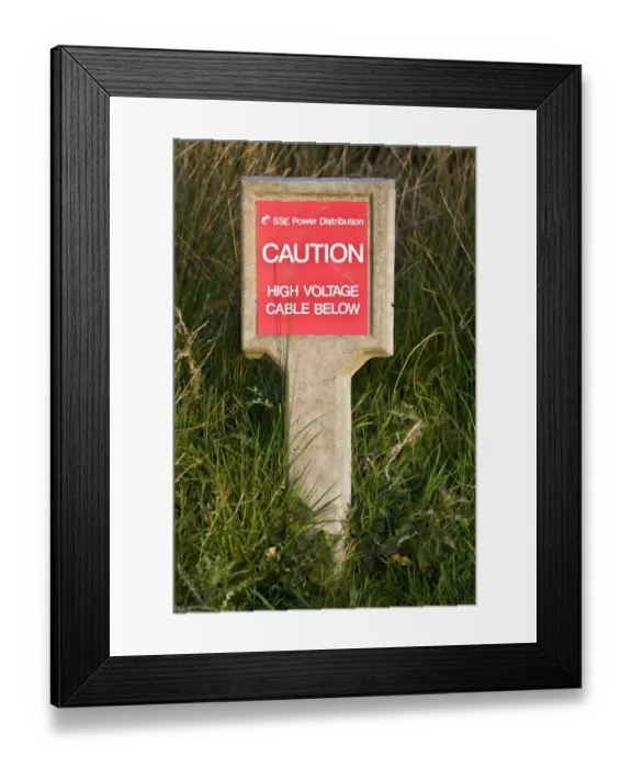 Framed Print : Caution, High Voltage Cable Below underground cable warning sign, Dorset, England, april Framed Print : Caution, High Voltage Cable Below underground cable warning sign, Dorset, England, april
