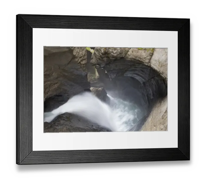 Framed Print : Glacier waterfall flowing over eroded rocks inside mountain, Trummelbach Falls, Lauterbrunnen, Bernese Oberland