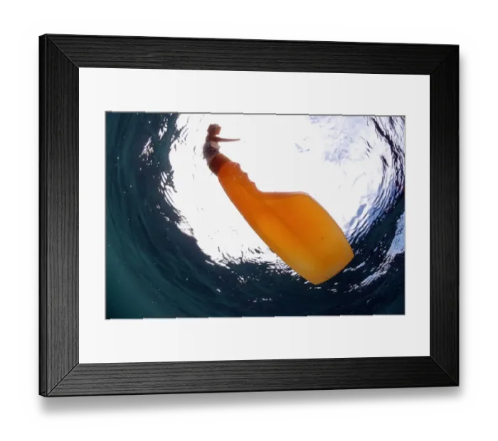 Framed Print : Plastic spray bottle floating in sea, Kimmeridge Bay, Isle of Purbeck, Dorset, England, august Framed Print : Plastic spray bottle floating in sea, Kimmeridge Bay, Isle of Purbeck, Dorset, England, august