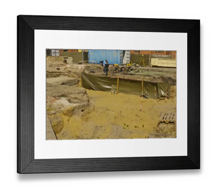 Framed Print : Archaeological dig site in historic town, Ribe, Jutland, Denmark, may Framed Print : Archaeological dig site in historic town, Ribe, Jutland, Denmark, may