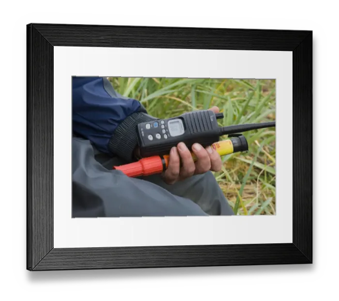 Framed Print : Close-up of hands of grizzly bear guide, holding radio and flare, Katmai N. P. Alaska, U. S. A. august Framed Print : Close-up of hands of grizzly bear guide, holding radio and flare, Katmai N. P. Alaska, U. S. A. august