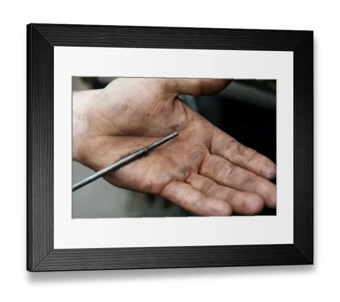 Framed Print : Checking oil level in tractor engine using dipstick, England, october Framed Print : Checking oil level in tractor engine using dipstick, England, october