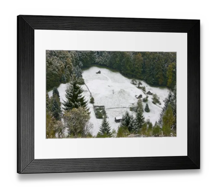 Framed Print : View of traditional farmland with small fields and barns, on mountain slopes covered with snow, Piatra Craiulu N. P Framed Print : View of traditional farmland with small fields and barns, on mountain slopes covered with snow, Piatra Craiulu N. P