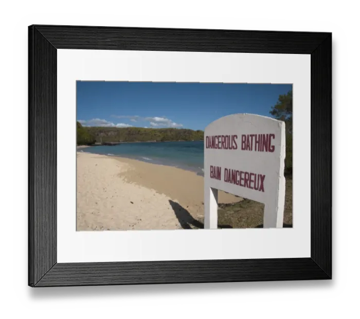 Framed Print : Dangerous Bathing, Bain Dangereux bilingual sign on sandy beach, Southwest Mauritius