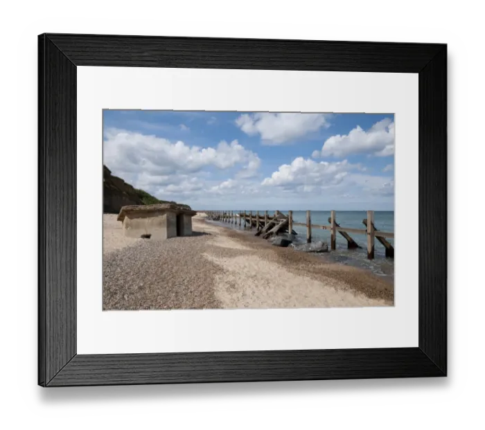 Framed Print : Coastal defence groynes and upside-down World War Two pillbox on beach, Happisburgh, Norfolk, England, august Framed Print : Coastal defence groynes and upside-down World War Two pillbox on beach, Happisburgh, Norfolk, England, august