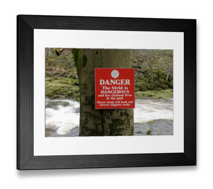 Framed Print : Danger, The Strid is Dangerous warning sign beside fast-flowing river, The Strid, River Wharfe, Bolton Abbey Estate