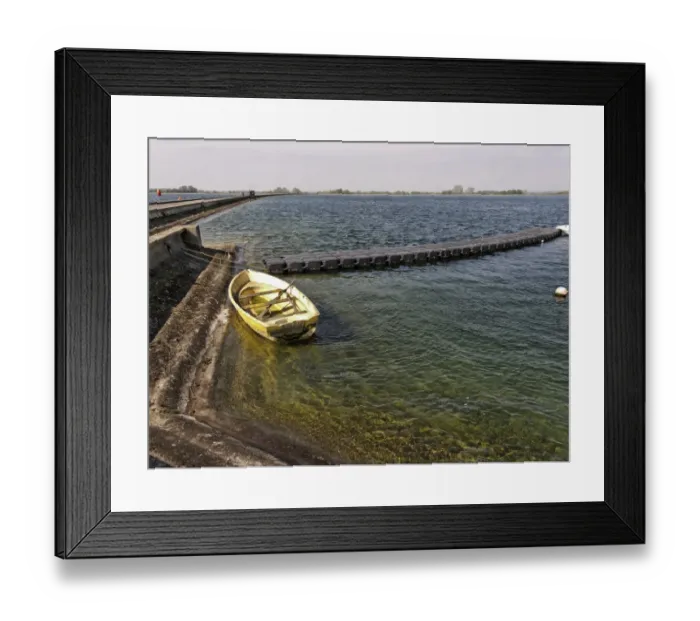 Framed Print : Rowing boat at edge of manmade reservoir, Farmoor Reservoir, Farmoor, Thames Valley, Oxfordshire, England, april