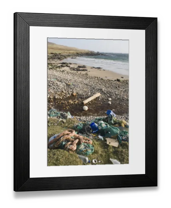 Framed Print : Rubbish washed up on beach from sea, Shetland Islands, Scotland, april