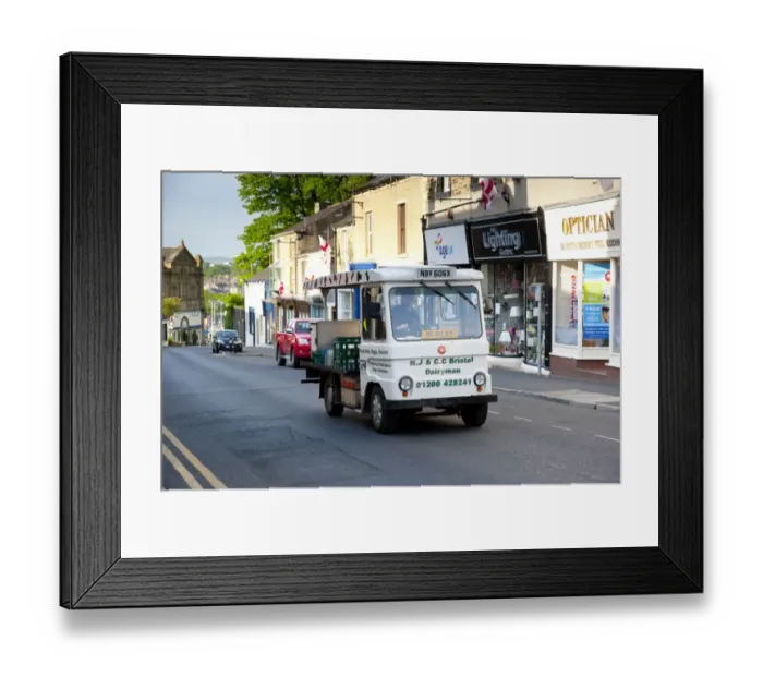 Framed Print : Electric milk float delivering in town, Clitheroe, Lancashire, England, may Framed Print : Electric milk float delivering in town, Clitheroe, Lancashire, England, may