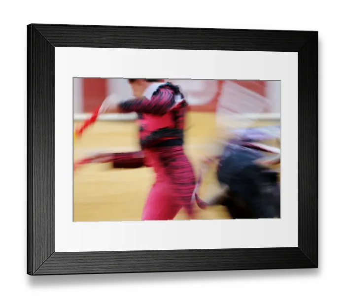 Framed Print : Bullfighting, Banderillero escaping from bull in bullring, blurred movement, Tercio de banderillas stage of bullfight Framed Print : Bullfighting, Banderillero escaping from bull in bullring, blurred movement, Tercio de banderillas stage of bullfight
