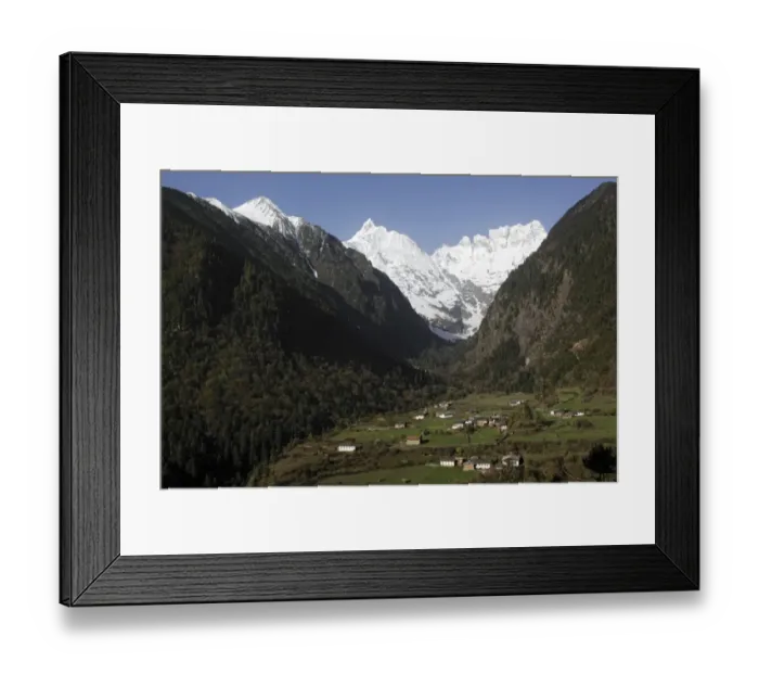 Framed Print : View of mountain valley with village at dawn, with snow covered peaks in background, Lower Yubeng Village, Miancimu