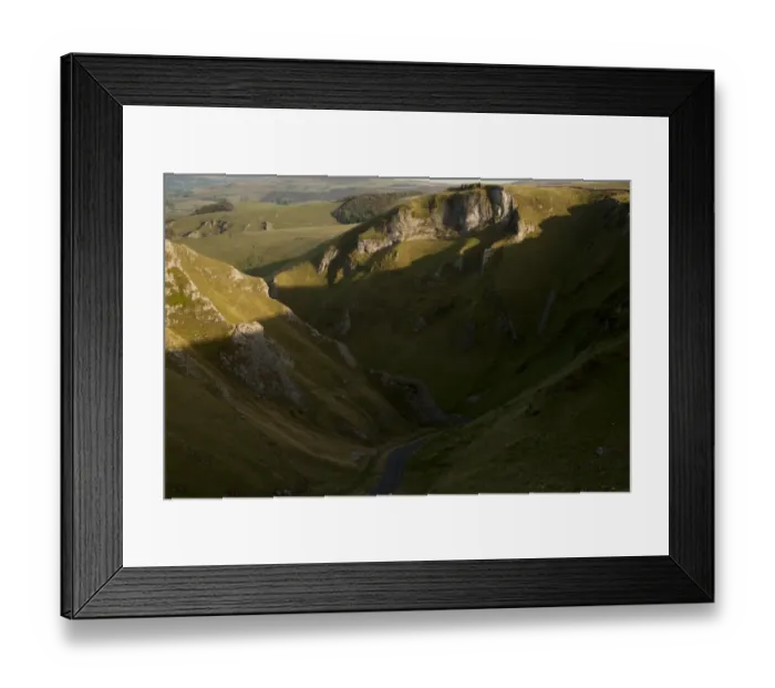 Framed Print : View of road through moorland with limestone pinnacles in shadow, Winnats Pass, Hope Valley, Peak District, Derbyshire Framed Print : View of road through moorland with limestone pinnacles in shadow, Winnats Pass, Hope Valley, Peak District, Derbyshire