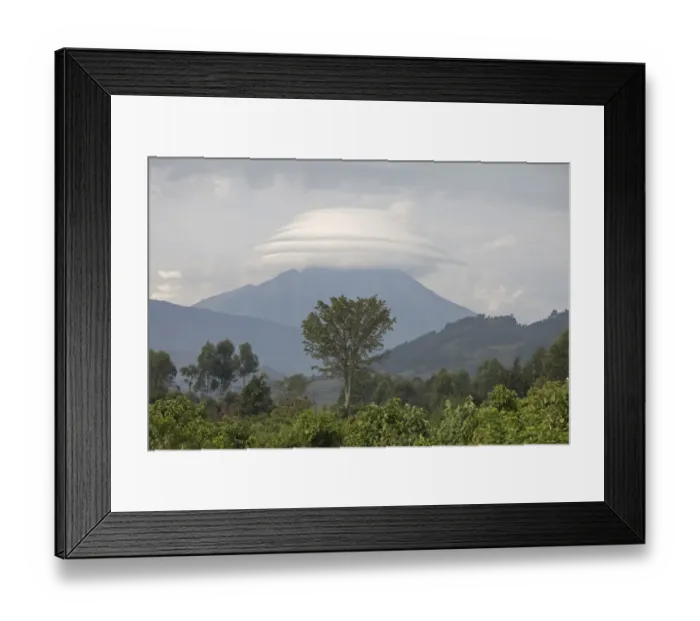 Framed Print : View of montane landscape and distant volcano with lenticular cloud formation, Virunga Mountains, Uganda Framed Print : View of montane landscape and distant volcano with lenticular cloud formation, Virunga Mountains, Uganda