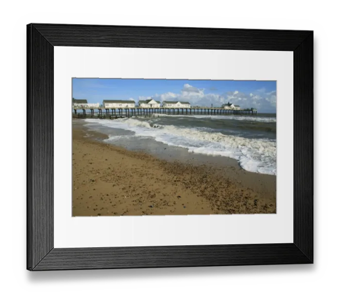 Framed Print : View of beach and restored pier with rough sea, Southwold Pier, Southwold, Suffolk, England, october