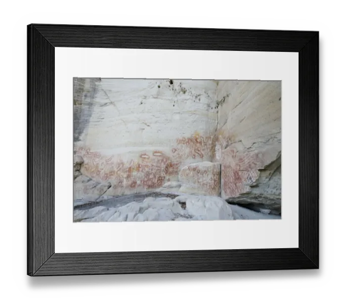 Framed Print : Aboriginal rock art, stencil art dated circa 2000 years old, showing depictions of hands, boomerangs Framed Print : Aboriginal rock art, stencil art dated circa 2000 years old, showing depictions of hands, boomerangs
