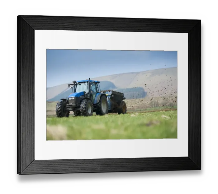 Framed Print : New Holland TS115 tractor with muckspreader, spreading farmyard manure on grassland, Whitewell, Lancashire, England Framed Print : New Holland TS115 tractor with muckspreader, spreading farmyard manure on grassland, Whitewell, Lancashire, England