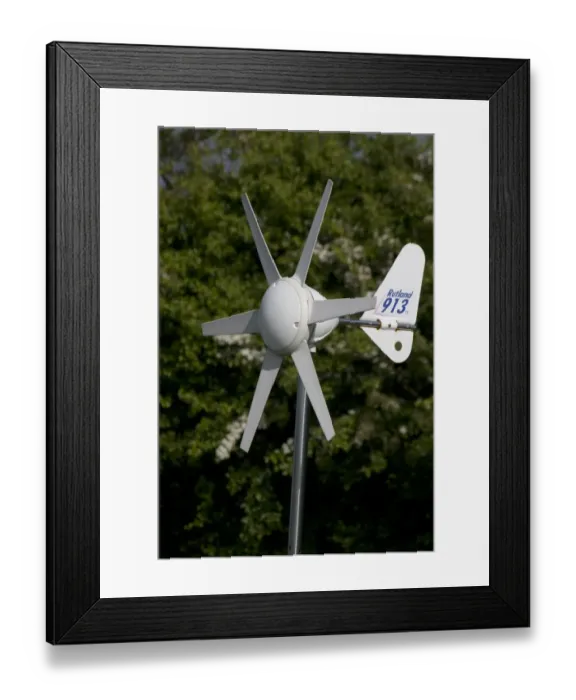 Framed Print : Close-up of small wind turbine on narrowboat, supplying energy to domestic items, Oxfordshire, England, may Framed Print : Close-up of small wind turbine on narrowboat, supplying energy to domestic items, Oxfordshire, England, may