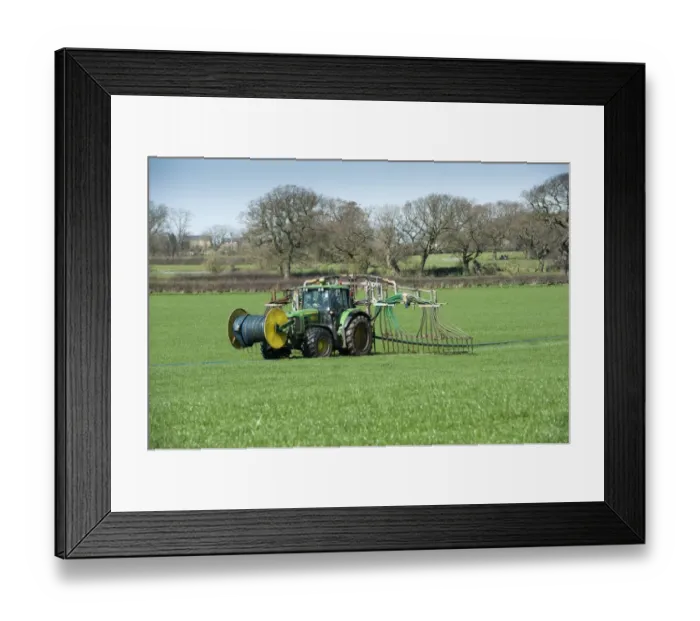 Framed Print : John Deere tractor with umbilical slurry spreader, spreading slurry into pasture, Winmarleigh, Lancashire, England Framed Print : John Deere tractor with umbilical slurry spreader, spreading slurry into pasture, Winmarleigh, Lancashire, England
