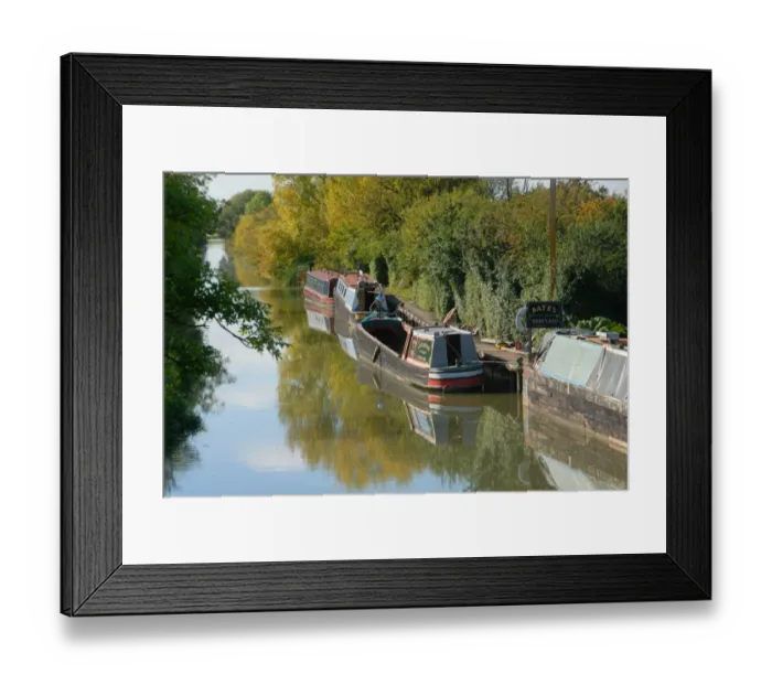 Framed Print : Narrowboats moored at boatyard on canal, Aylesbury Arm, Grand Union Canal, near Puttenham, Hertfordshire, England Framed Print : Narrowboats moored at boatyard on canal, Aylesbury Arm, Grand Union Canal, near Puttenham, Hertfordshire, England