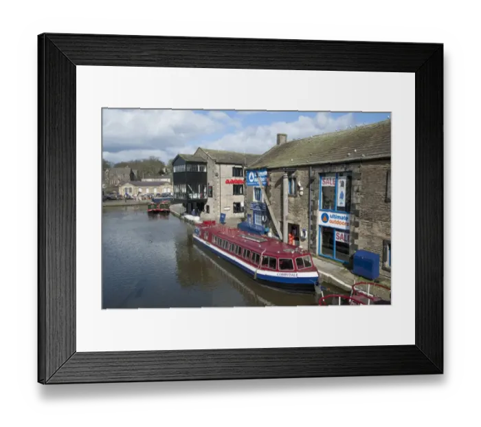 Framed Print : Tour boat and narrowboats moored on canal in town, Leeds and Liverpool Canal, Skipton, North Yorkshire, England, march Framed Print : Tour boat and narrowboats moored on canal in town, Leeds and Liverpool Canal, Skipton, North Yorkshire, England, march