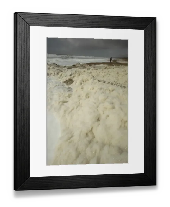 Framed Print : Sea foam washing up on beach after storm, Hengistbury Head, Dorset, England, april Framed Print : Sea foam washing up on beach after storm, Hengistbury Head, Dorset, England, april