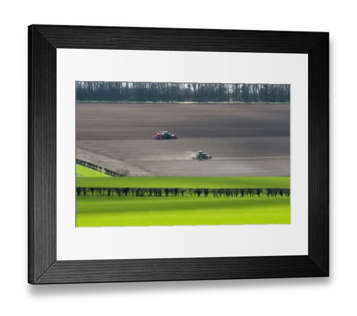 Framed Print : Tractors cultivating and drilling cereal crop in arable farmland, Tibthorpe, North Yorkshire, England, march Framed Print : Tractors cultivating and drilling cereal crop in arable farmland, Tibthorpe, North Yorkshire, England, march